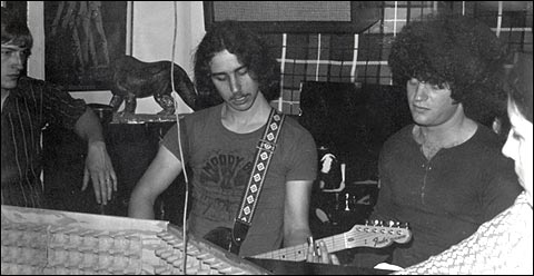 l-r: Charlie Wilhelm, me, my brother, Tom, and April Newswander up in the attic...